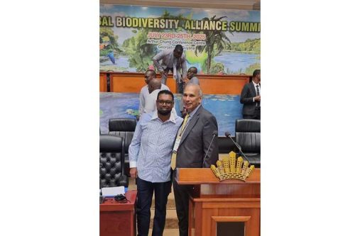 President Mohamed Irfaan Ali and agronomist and international manager, Muhammad Ibrahim, at the Global Biodiversity Partnership Summit in Georgetown