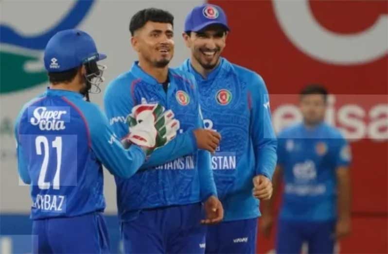 Mujeeb Ur Rahman (centre) took four wickets to bowl Afghanistan to victory over the West Indies in the second T20I