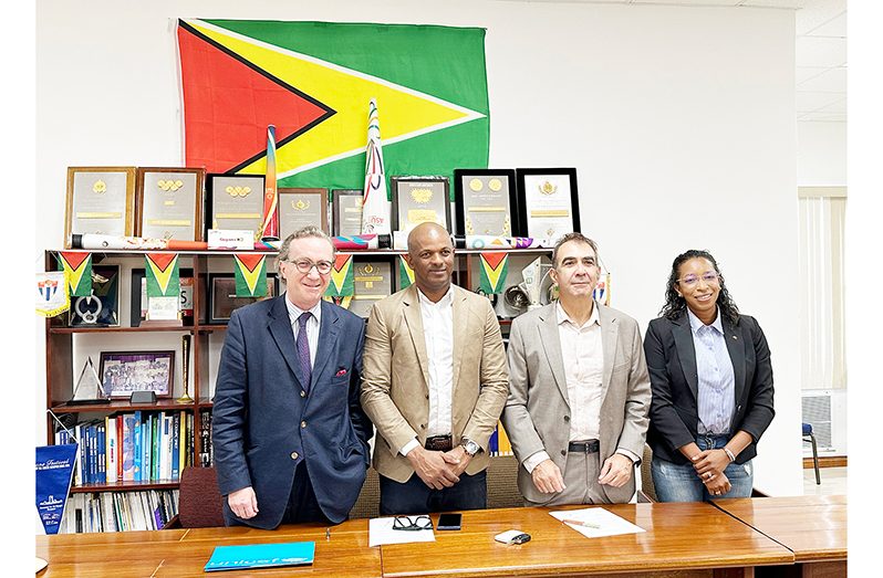 From Left- Mr. Nicolas Pron, UNICEF Area Representative to Guyana & Suriname, Mr. Godfrey Munroe, the President of the Guyana Olympic Association and Mr. Jean-Jacques Forté, Chargé d’Affaires & Head of the French Diplomatic Bureau in Guyana signing the agreement. Cristy Campbell, Vice President of the Guyana Olympic Association witnessed the signing.