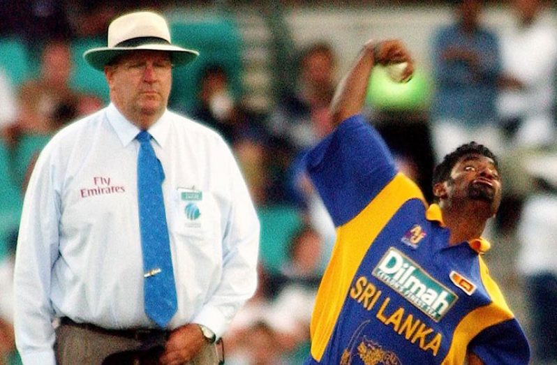 Australian Umpire Darrell Hair watches Sri Lanka's Muttiah Muralitharan bowl during a one day match against England at the Sydney Cricket Ground, January 13, 2003. REUTERS/Tim Wimborne/File Photo