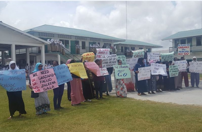 Parents protesting in front  the Al Madinah Academy School in Region Two