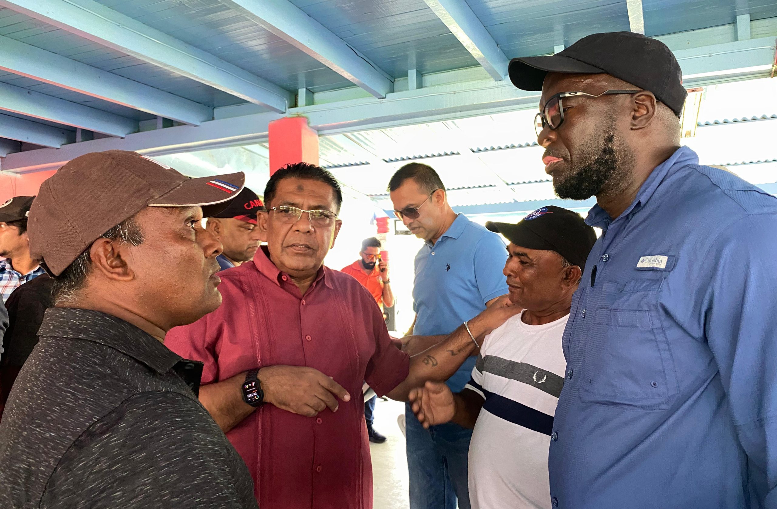 Minister Mustapha engaging farmers and residents on Friday