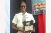 Sarah Reid after collecting an award for her outstanding performance at the 2019 CSEC examinations