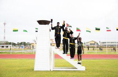 LET THE GAMES BEGIN! District 10’s Ronardo Greene, Shavin Greene, Nikita Fiedtkou and Esau Lawden following the lighting of the Games’ Flames. (Samuel Maughn photos)