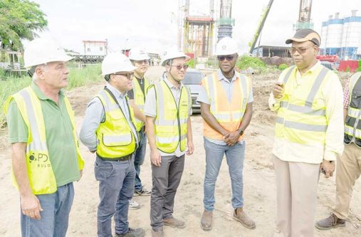 Minister of Public Works, Bishop Juan Edghill, Patrick Thompson, the Chief Transport Officer (Minister’s right), and project consultants for the New Demerara River Bridge