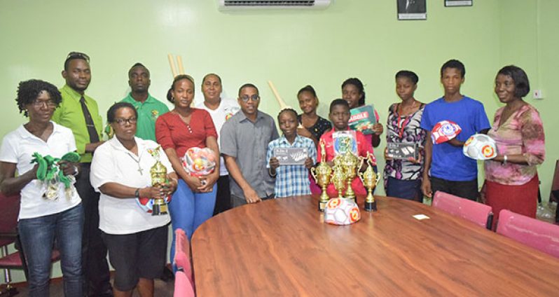 The recipients posewith NSC Technical Development Officer Seon Erskine and Assistant Director of Sport Brian Smith. (Cullen Bess-Nelson photo)