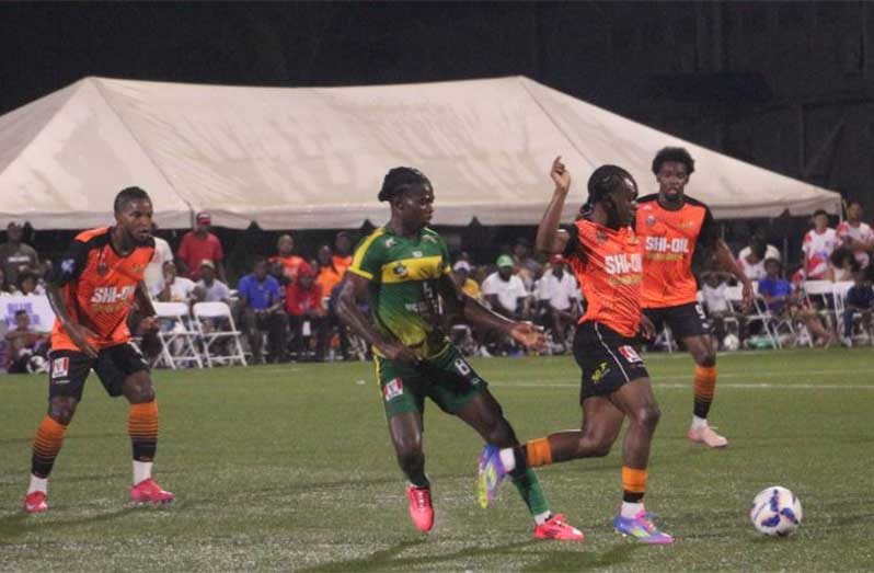 Slingerz’ Derron Niles on the ball with Slingerz and GDF locked in battle in GFF Elite League