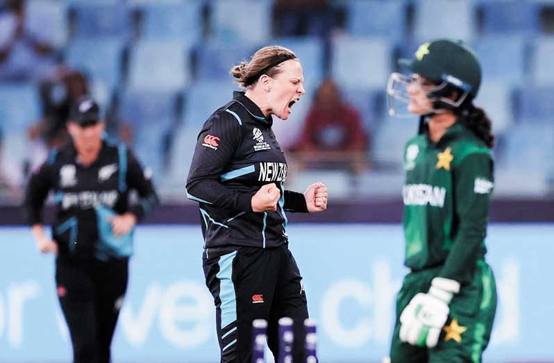 New Zealand players celebrate after clinching a semi-final spot.