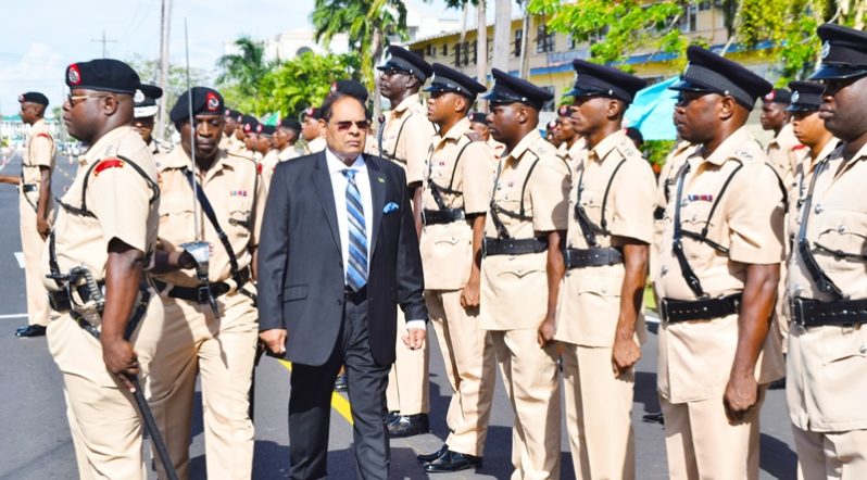 Prime Minister Moses Nagamootoo, who is performing the duties of President, inspects the Guard of Honour on Thursday. [Cullen Bess-Nelson photo]