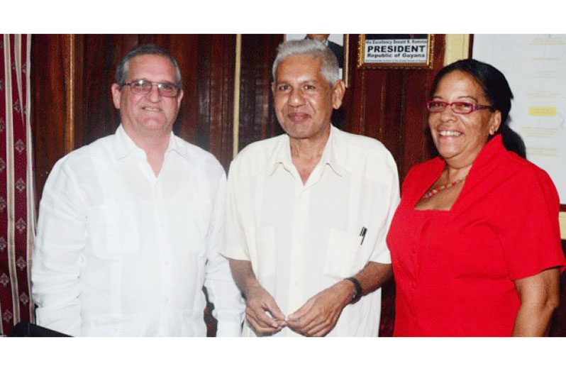 L-R Cuba’s former Ambassador to Guyana, Mr. Julio Cesar Gonsalez Marchante, Guyana Chronicle’s former senior editor, the late Chamanlall Naipaul, and Economic and Commercial Counselor, Ms. Lic. Praxedes Louis Nordet during the courtesy call by the Cuban officials in March 2014 (Adrian Narine photo)