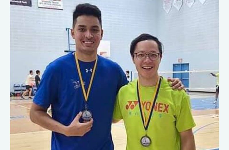 Narayan Ramdhani (left) all smiles after defeating Calvin Kwan in the Men’s Singles final.