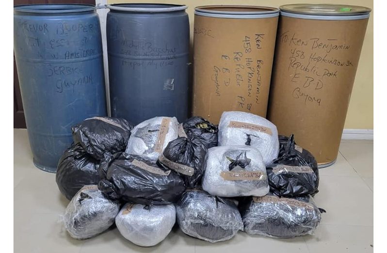 The barrels and plastic bags of seized narcotics