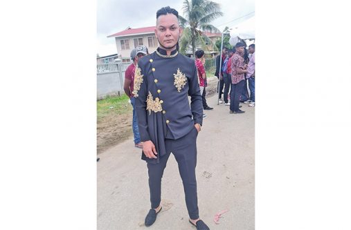 Nash Narine has sown hundreds of outfits for satisfied customers including brides and the reigning Mrs Guyana World, Kristal Inshan. In this photo he wears his own design (Nash Narine photos)