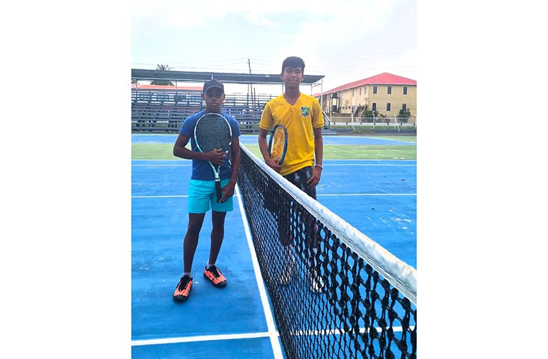 Boys U-14 Champion Nathan DeNobrega (right) beat Zephan Henry
