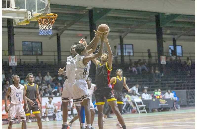 QC and Saints battling in the KFC National Schools Basketball Festival