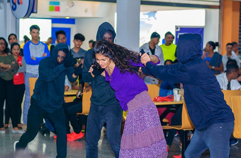 A short interpretive dance on drug abuse by the students at the Giftland Mall (Delano Williams photo)