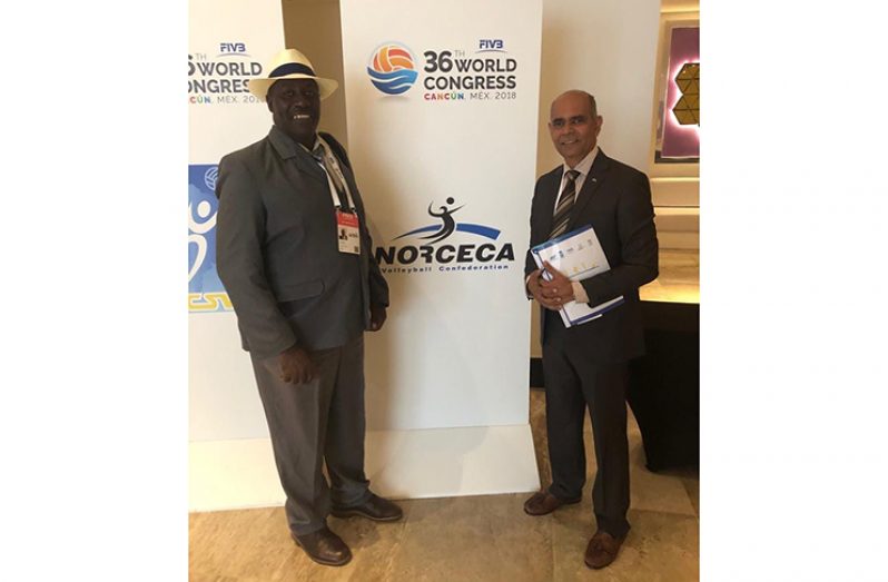President of the Guyana Volleyball Federation (GVF) Levi Nedd (left) with FIVB Development Commission President, Mustaque Mohammed.