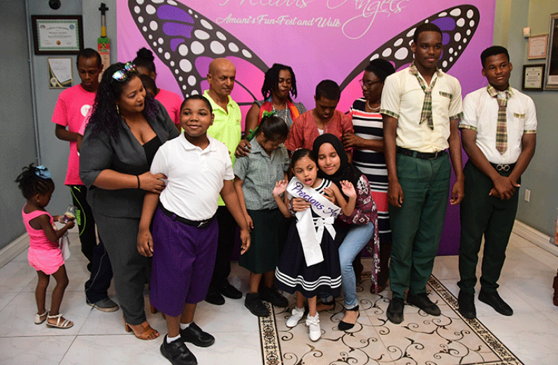 Some of the persons who attended the donation ceremony on Friday (Adrian Narine photo)