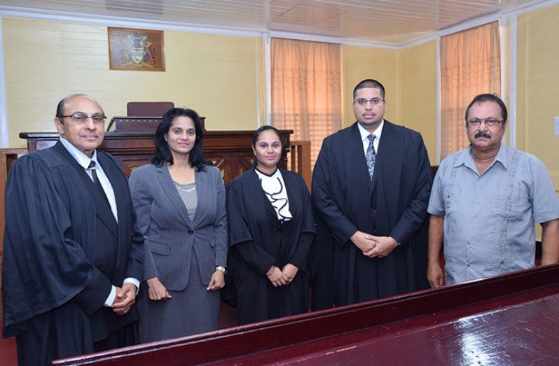 New attorney Nekeisha Persaud is flanked by Justice Nareshwar Harnanan, Attorney Juman Yassin and her parents at the High Court