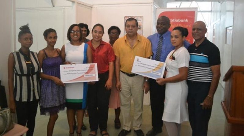 Chief Executive Officer of the Georgetown Public Hospital Corporation, Michael Khan and staff; NAMILCO’s Finance Controller, Fitzroy McLeod, and Scotia Bank’s Marketing Manager, Jennifer Cipriani during the handing over ceremony at GPHC Neo-Natal Unit