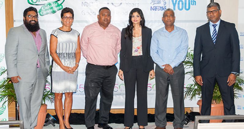 Nestlé representatives and distributors who have already pledged their support to the Alliance for YOUth Initiative. They are, from left: Beepat’s CEO, Mr. Kristofer Beepat; Nestlé Corporate Communications Manager, Ms. Denise d’Abadie; DSL Operations Manager, Mr. Bryan Prittipaul; Nestlé Human Resources Manager, Ms. Kristen Ramlogan; Commercial Director, Massy Distribution, Mr. Navin Thakur; and Sales Manager, Nestlé Caribbean International, Mr. Sudesh Mahase (Photo by Delano Williams)