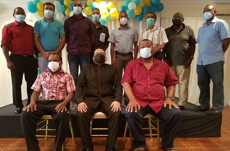 Newly elected president of the Guyana Cricket Board, Bissondyal Singh (sitting at centre) flanked by his new executive members following Monday's elections ( Clifton Ross).