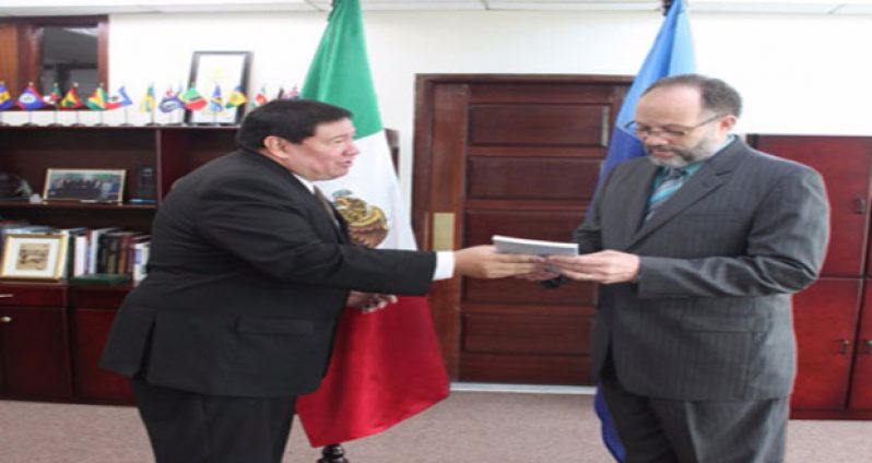 Mr. Ivan Roberto Sierra-Medel presenting his letter of credence to CARICOM Secretary-General, Ambassador Irwin LaRocque