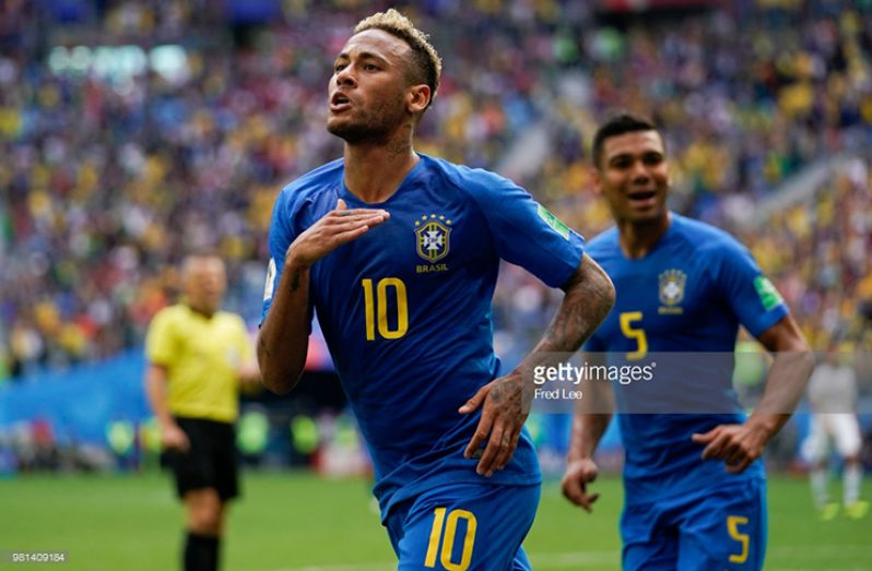Neymar of Brazil celebrates scoring the second goal of his team during the 2018 FIFA World Cup Russia Group E match against Costa Rica at Saint Petersburg Stadium yesterday. (Photo by Fred Lee/Getty Images)