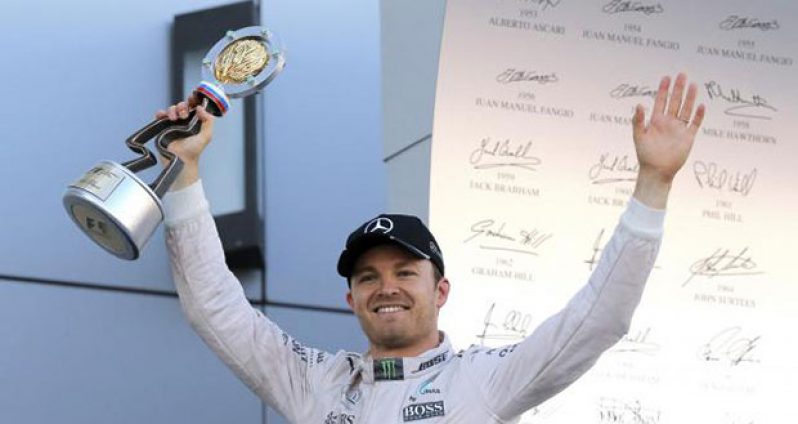 Mercedes F1 driver Nico Rosberg of Germany holds his trophy after the Russian Grand Prix. 
Reuters/Maxim Shemetov