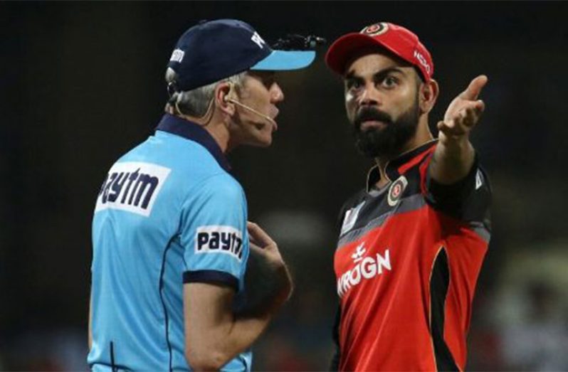 Nigel Llong and Virat Kohli have an argument over the 'no-ball'. (BCCI photo)