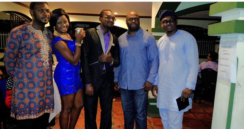 Fourth from right is Mr. Obinna, visiting representative of the Nigerian Embassy in Washington. Others, from left, are doctors in training Asiegbu Chinebu; Ijeoma Oparara (designer of the Nigerian African wear modelled); Past President and Emcee, Samuel Obiegbuse; and Abel Adekwa.