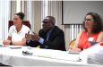 Director of Sport, Steve Ninvalle, flanked by Sarah Newton (left) and Tamara Wood (right) of the Canadian Lifesaving Society, makes a point to the participants of the programme.