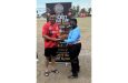 Canada’s man-of-the-match, Nitin Gosain, receives his award from umpire Ava Baker, compliments of Trophy Stall