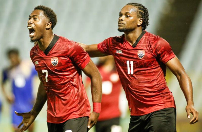 Noah Powder and Levi Garcia celebrate Trinidad and Tobago’s 4-1 victory over St. Vincent and the Grenadines in League B, Group C action on Monday night. (Photo: CONCACAF)