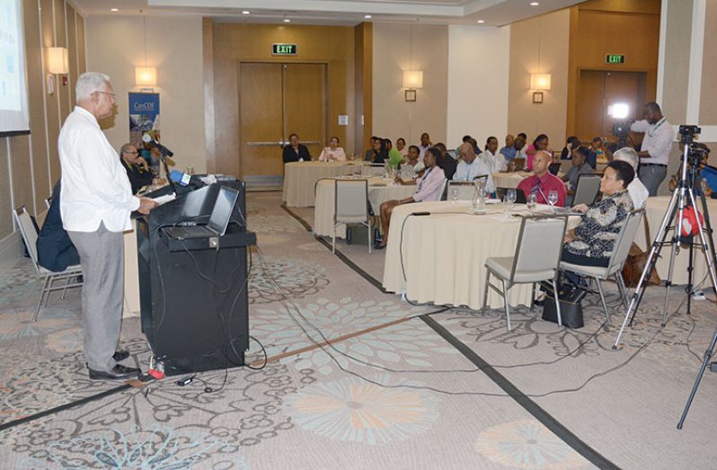 Agriculture Minister Mr Noel Holder, addressing the CariCOF workshop at the Marriott Hotel (Rabindra Rooplall photo)