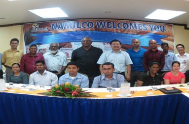 Participants at the NAMILCO Noodles Seminar pose with Managing Director, Bert Sukhai (center standing) and Dr Gary Hou (left of Managing Director). Far left is Mr Afeeze Khan who was the MC at the event