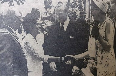 Independence greeting - 
Mrs R.B Gajraj, wife of the Mayor of Georgetown, greets Mrs Anthony Greenwood, wife of the British Minister of Overseas Development, as their husbands look on, when they met at the official handing over ceremony of the Independence arch, Sunday, May 22, 1966