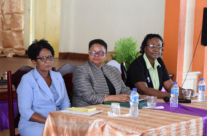 Minister of Public Health Volda Lawrence flanked by officials of the GNA