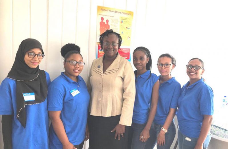 With her principal tutor Cleopatra Barkoye (third, left) and colleagues