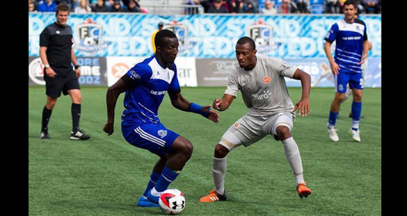 Golden Jaguars skipper and FC Puerto Rico’s Christopher Nurse challenges for the ball during his game against FC Edmonton.