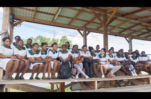 Several students of the Georgetown School of Nursing sit at Durban Park following a meeting with Minister within the Ministry of Public Health, Dr Karen Cummings and other officials on Tuesday