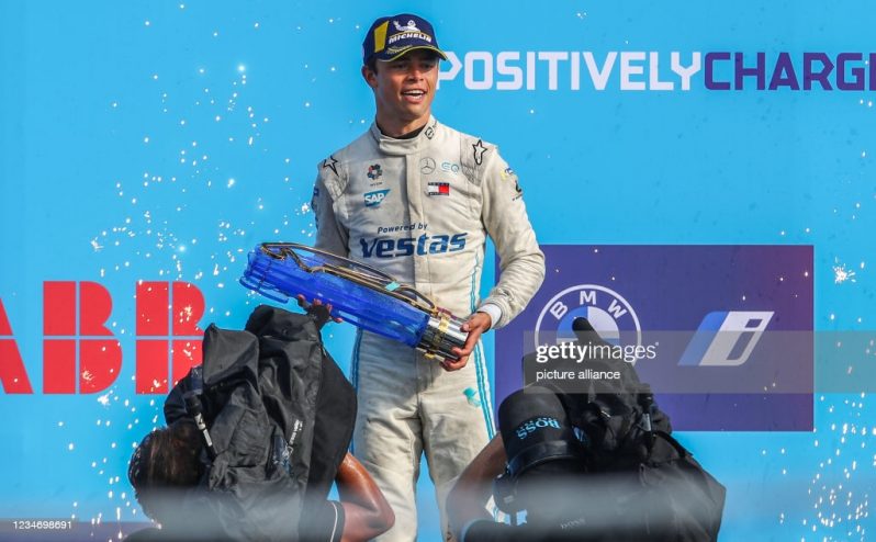 Formula E World Championship, ePrix 2021, race at the former Tempelhof Airport. Nyck de Vries of the Mercedes-Benz EQ Formula E Team shows off the trophy as he is honoured as 2021 World Champion. Photo: Andreas Gora/dpa (Photo by Andreas Gora/picture alliance via Getty Images)