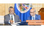 Permanent Representative of Guyana to the OAS, Samuel Hinds and General Secretary Albert Ramdin during Monday’s signing agreement
