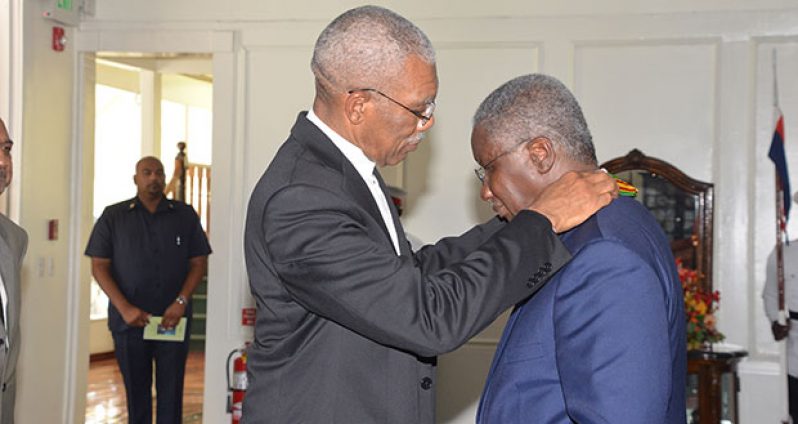 President David Granger confers Prime Minister of Barbados Freundel Stuart with the National Award, the Order of Roraima