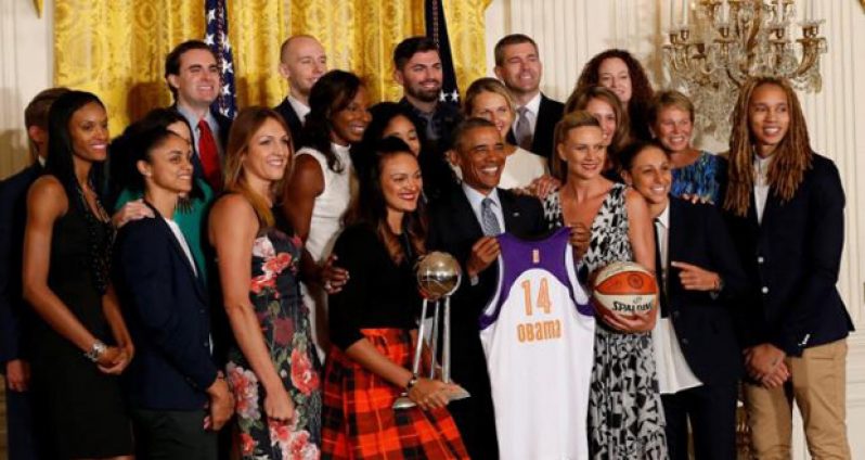 President Barack Obama poses with members of the Phoenix Mercury at a ceremony honouring the 2014 WNBA champions, in the East Room at the White House. (Mandatory Credit: Geoff Burke-USA TODAY Sports)