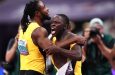 Oblique Seville (right) is congratulated by countryman Kishane Thompson after winning the men’s 100 metres at the World Athletic Championships in Tokyo