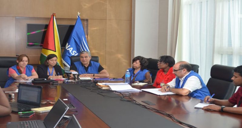 UNASUR observer mission’s Chief Representative, Domingo Paredes with other members of the team at the press briefing at the Marriott Hotel in Kingston