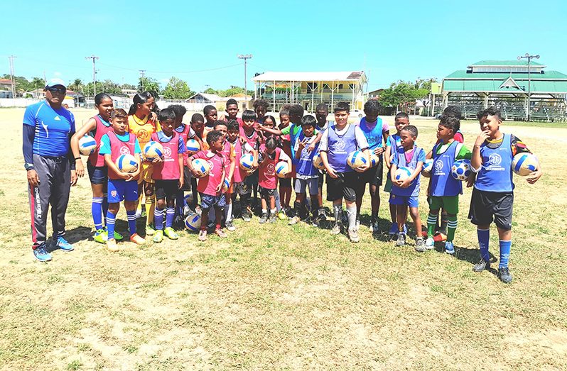 Some of the officials and participants of the Bartica FA summer camp