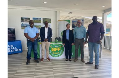 Officials from SRKN’gineering and Associates Limited along with the top brass of the Guyana Football Federation at the National Training Facility on Friday