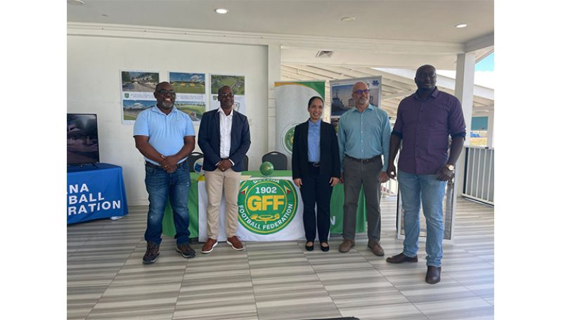 Officials from SRKN’gineering and Associates Limited along with the top brass of the Guyana Football Federation at the National Training Facility on Friday